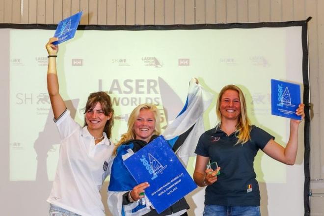 Monika Mikkola (middle) from Finland is the happy Youth World Championship (U-21) winner in the Laser Radial in Kiel. Vasileia Karachaliou (Greece) does win the silver medal. Maité Carlier (Belgium, right) finishes on rank three © www.segel-bilder.de